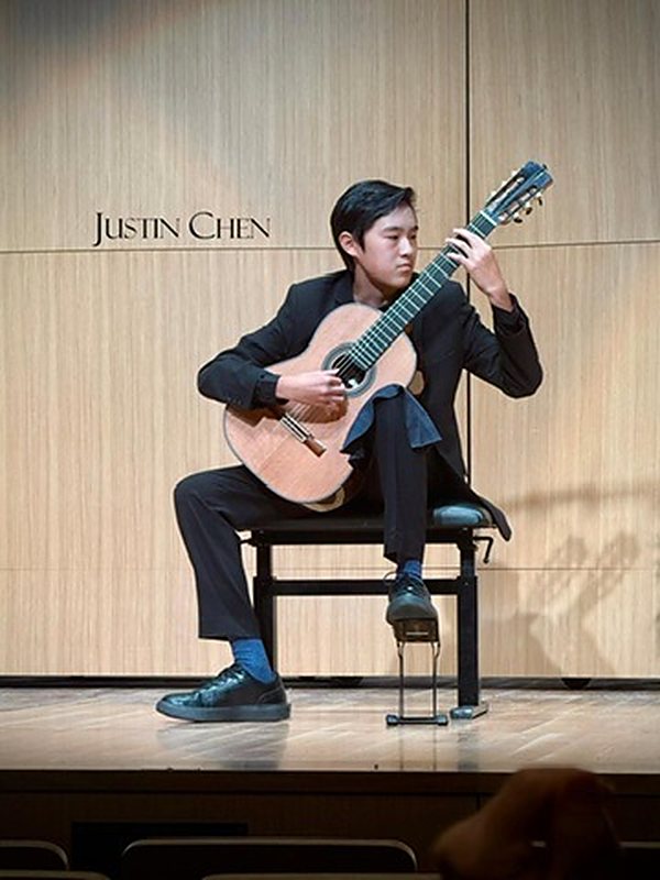 Justin Chen performing in the 2026 final